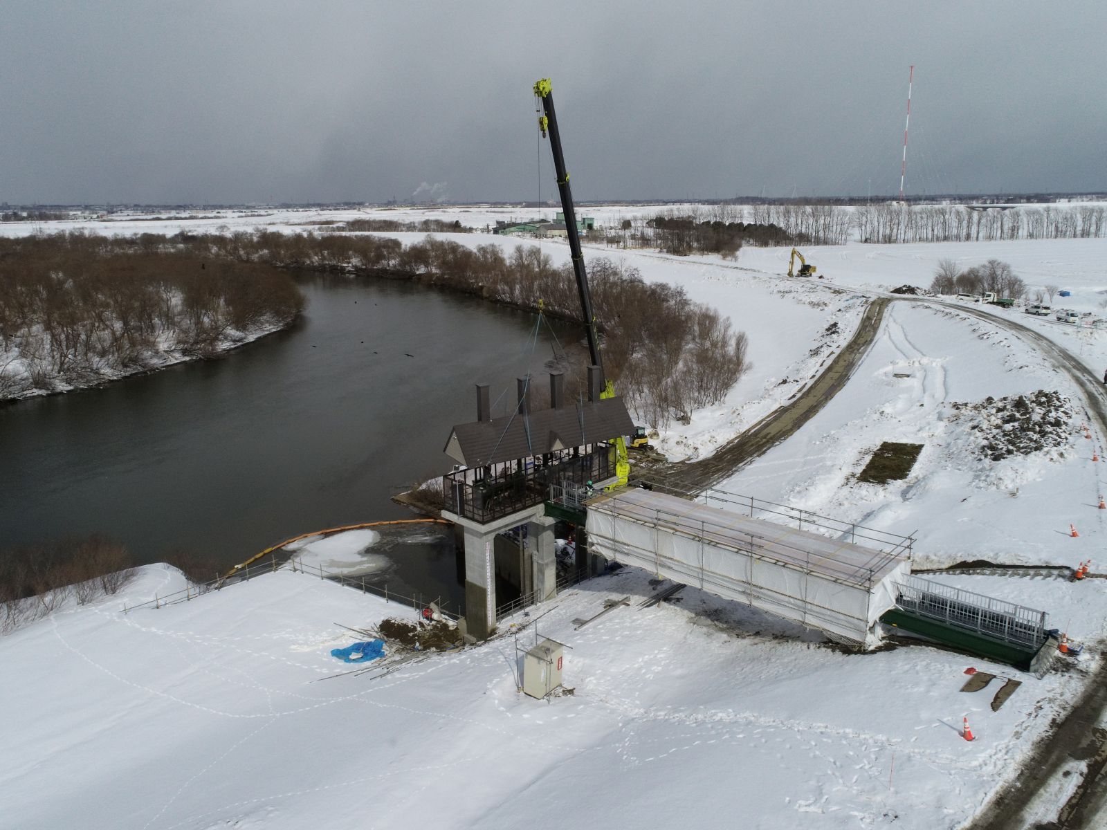 石狩川改修補償工事の内　江別太上流築堤盛土外工事